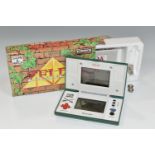 ZELDA NINTENDO GAME & WATCH BOXED, includes the system and instruction manual, requires new
