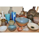 A LARGE COLLECTION OF STUDIO POTTERY, twenty nine pieces comprising large chargers, bowls, vases and