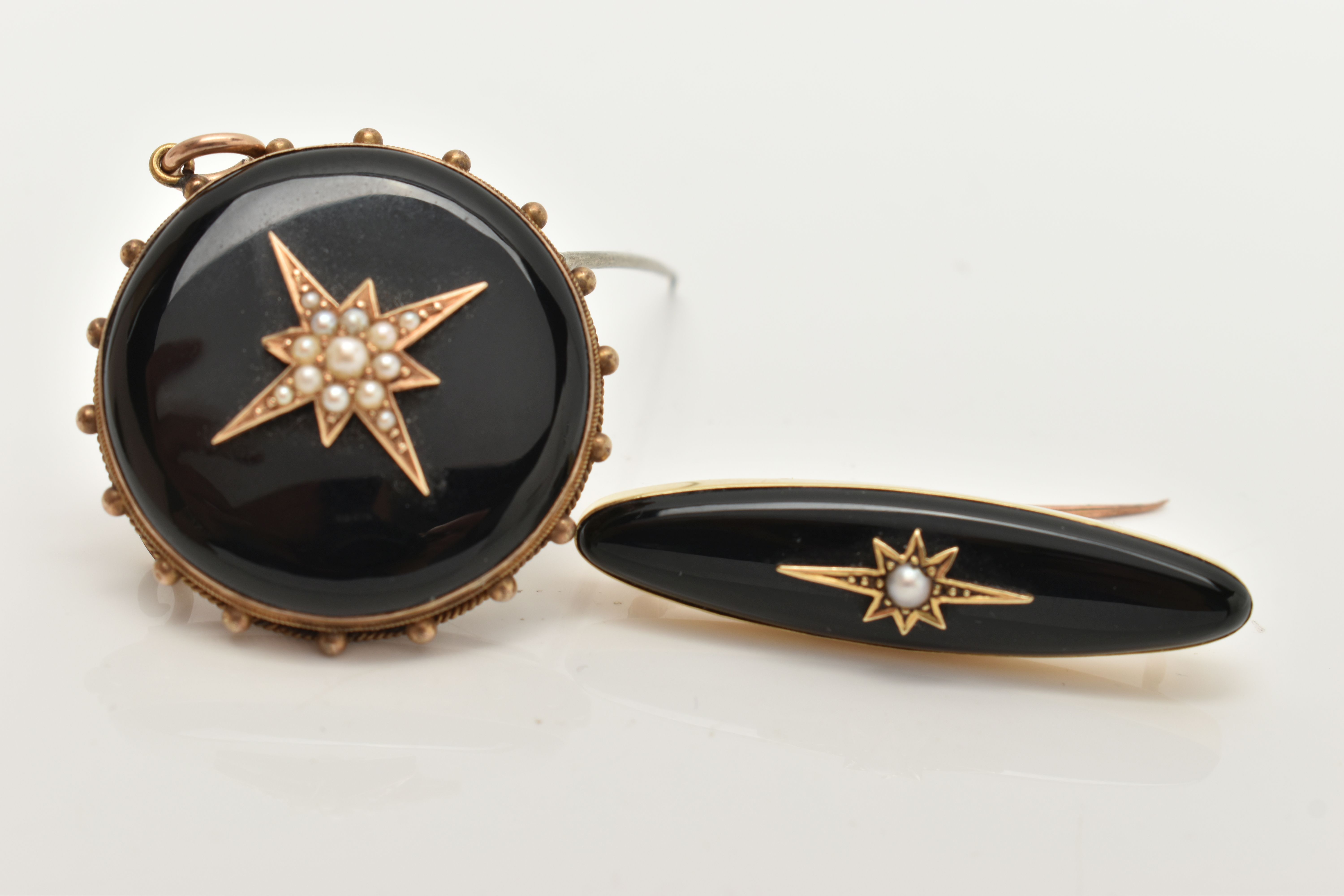 TWO LATE VICTORIAN ONYX AND SPLIT PEARL MEMORIAL BROOCHES, the first of circular outline with