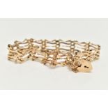 A 9CT GOLD GATE BRACELET, five bar gate bracelet fitted with a heart padlock clasp, with