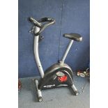 AN OLYMPUS SPORT OS-10201 PACE EXERCISE BIKE with digital read out