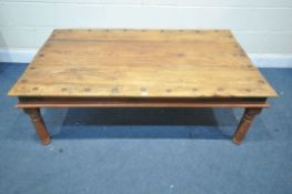 A HARDWOOD INDIAN COFFEE TABLE, length 151cm x depth 89cm x height 50cm (condition report: the