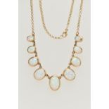 A 9CT GOLD, SYNTHETIC OPAL NECKLACE, designed as a graduated series of oval synthetic opal