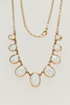 A 9CT GOLD, SYNTHETIC OPAL NECKLACE, designed as a graduated series of oval synthetic opal