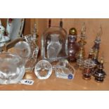 A COLLECTION OF GLASS SCULPTURES AND SCENT BOTTLES, comprising three Mats Jonasson relief glass