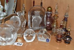 A COLLECTION OF GLASS SCULPTURES AND SCENT BOTTLES, comprising three Mats Jonasson relief glass