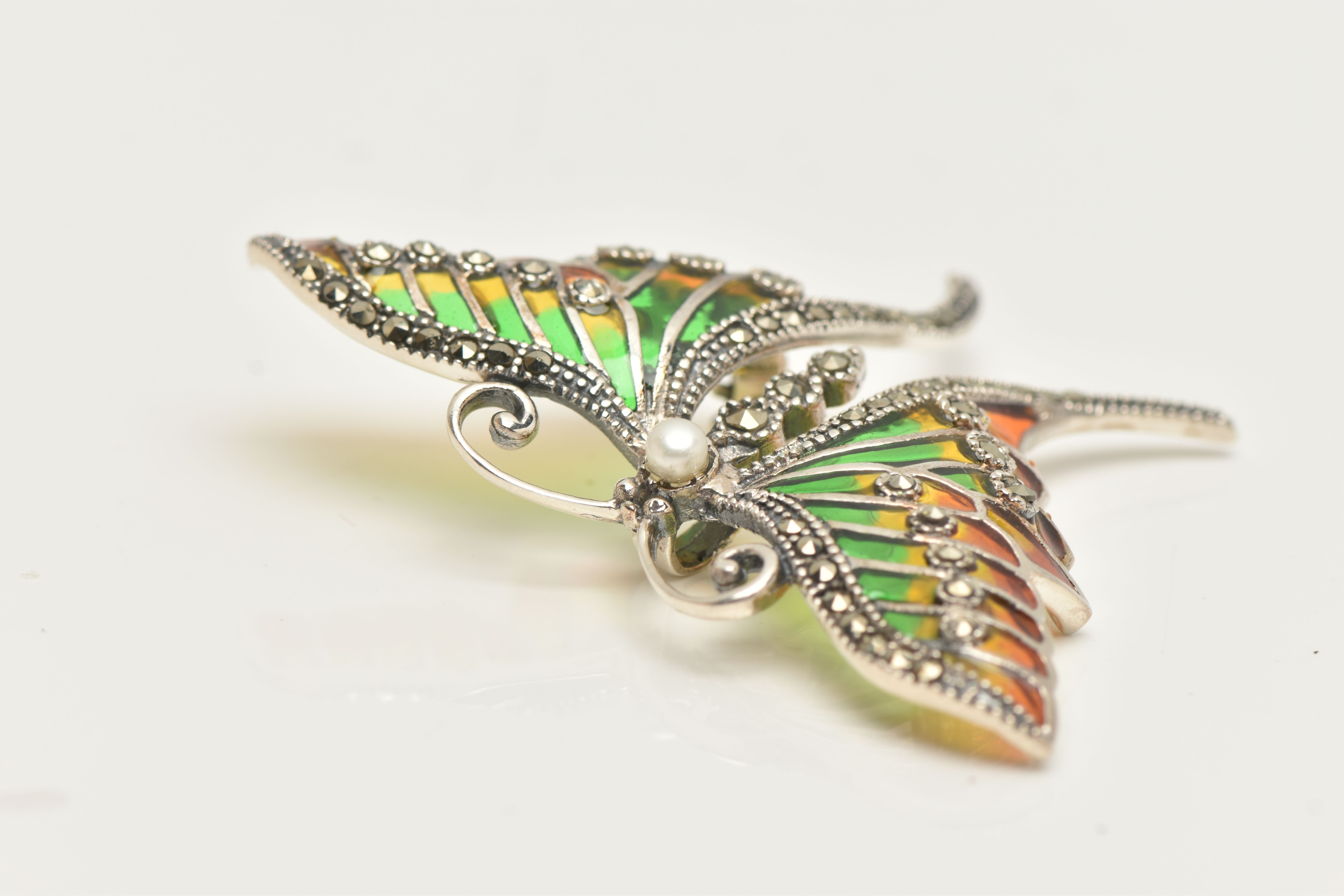 A WHITE METAL PLIQUE A JOUR BROOCH, in the form of butterfly with red, green and yellow enamel - Image 2 of 3