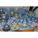 A QUANTITY OF WEDGWOOD JASPERWARES, over sixty pieces to include jugs, vases, a covered vase