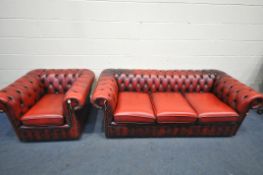 AN OXBLOOD LEATHER CHESTERFIELD TWO PIECE SUITE, comprising a three seater settee, length 192cm x