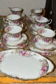 SIX ROYAL ALBERT 'AUTUMN ROSES' TRIOS AND TRAY, comprising six each of tea plates, teacups and