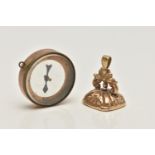 TWO 9CT GOLD ITEMS, to include an agate set fob with scrolling detail, with gold hallmark,