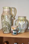 THREE PIECES OF DENBY CERAMICS BY GLYN COLLEDGE, comprising a green and brown jug, height 34cm, a