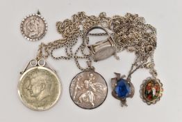 A SELECTION OF SILVER AND WHITE METAL JEWELLERY, to include a coin ring, two St. Christopher