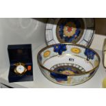 THREE PIECES OF ROYAL WORCESTER 'MILLENNIUM' GIFTWARES, comprising a salad/fruit bowl diameter