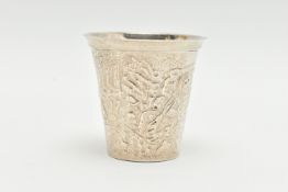 A LATE 19TH CENTURY VODKA CUP, embossed and chased with a continuous band with figures in a