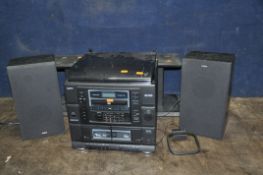A SANYO DC-X120 MIDI HI FI with two matching speakers and speaker stands (PAT pass and working) (