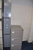 A VINTAGE THREE DRAWER FILING CABINET (no key) and three modern six drawer file cabinets (4)