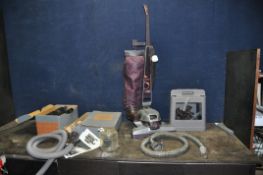 A KIRBY G5 UPRIGHT VACUUM CLEANER with numerous attachments (PAT fail due to broken plug but