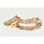 A 9CT GOLD GATE BRACELET, four bar gate bracelet, fitted with a heart padlock clasp, with additional