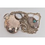 AN ASSORTMENT OF SILVER AND WHITE METAL JEWELLERY, to include a large silver locket, suspended