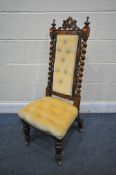 A VICTORIAN WALNUT HIGH BACK CHAIR, with barley twist uprights (condition report: solid frame)