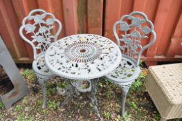 A CIRCULAR PAINTED METAL GARDEN TABLE, 60cm in diameter with two matching chairs (3)