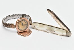 A LADYS WRISTWATCH AND A SILVER FRUIT KNIFE, manual wind watch, round gold dial, Arabic numerals,