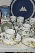 A GROUP OF WEDGWOOD COFFEE AND GIFT WARES, comprising six coffee cans and saucers in Wild Strawberry
