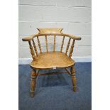 A 19TH CENTURY FRUITWOOD SMOKERS CAPTAINS CHAIR, possibly olive wood (condition report: aged wear