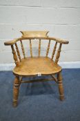 A 19TH CENTURY FRUITWOOD SMOKERS CAPTAINS CHAIR, possibly olive wood (condition report: aged wear