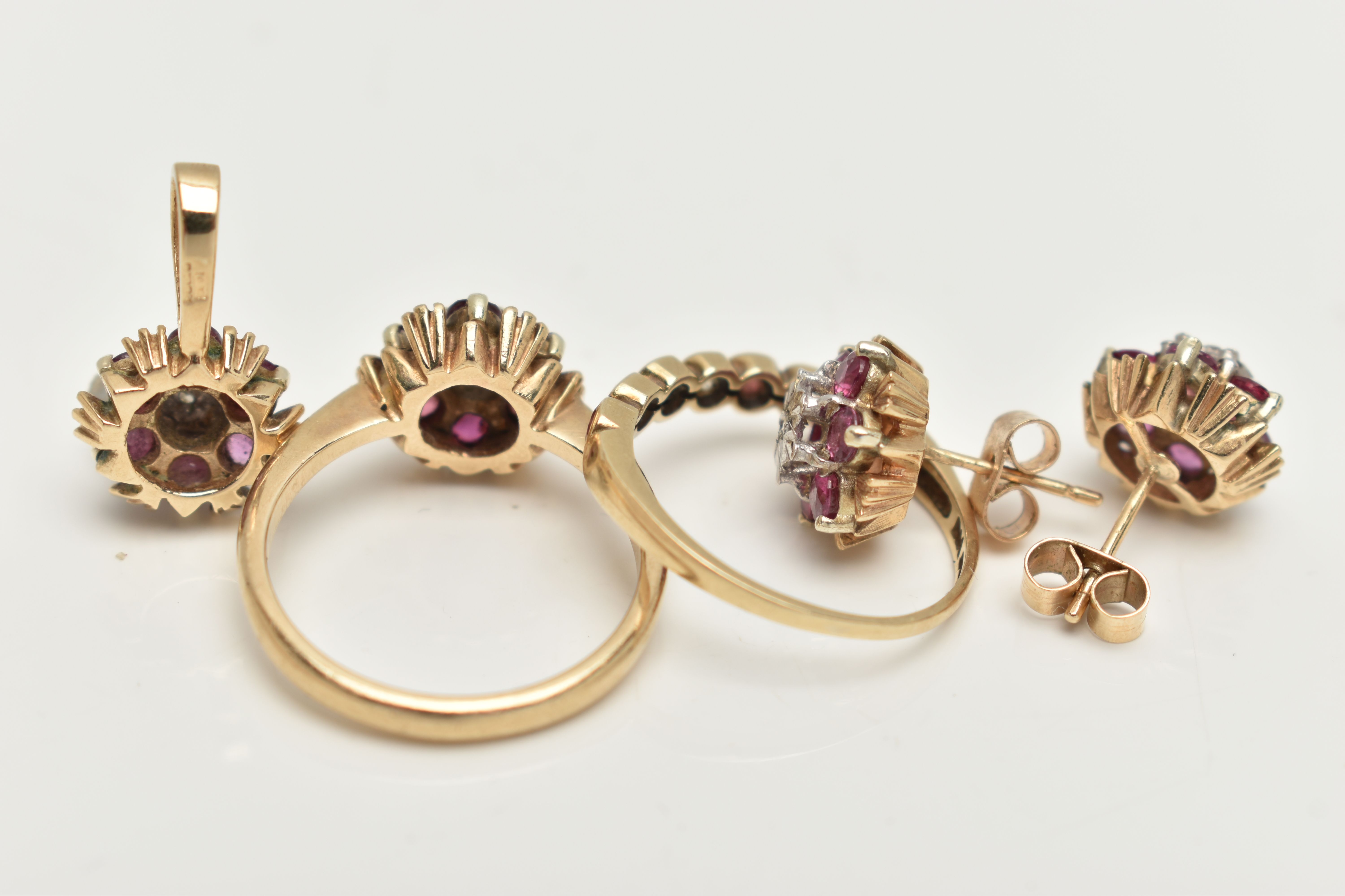 TWO 9CT GOLD RUBY AND DIAMOND RINGS, EARRINGS AND A PENDANT, the first a cluster ring, set with a - Image 4 of 4