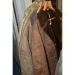 A GROUP OF FOUR VINTAGE SHEEPSKIN COATS, maker's names include Barretts Of Feckenham, Baily's of