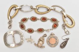 AN ASSORTMENT OF SILVER AND WHITE METAL JEWELLERY, to include a silver buckle, a silver teddy bear