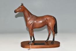 A BESWICK CONNOISSEUR MODEL OF RED RUM, model no 2510, matt, second quality, on a titled oval wooden