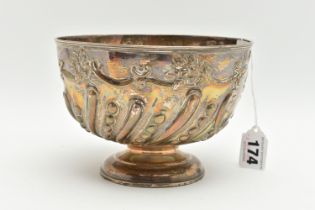 AN EDWARDIAN SILVER PEDESTAL ROSE BOWL, repoussé decorated with foliate scrolls, spiral design,