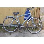 A CLAUD BUTLER WINDERMERE GENT BICYCLE with 18 speed Shimano twist grip gears, 20in frame, helmet (