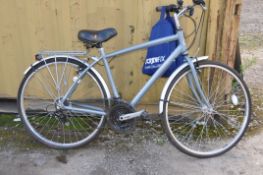 A CLAUD BUTLER WINDERMERE GENT BICYCLE with 18 speed Shimano twist grip gears, 20in frame, helmet (