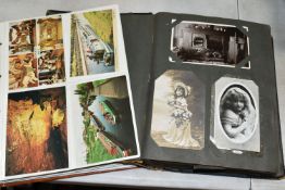 TWO ALBUMS OF POSTCARDS containing approximately 428 miscellaneous examples from the Edwardian era
