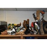 A COLLECTION OF BIRD SCULPTURES, twenty birds to include two woodpeckers attached to logs, a