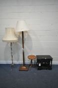A DARK OAK NEST OF THREE TABLES, along with a walnut wine table, a French walnut standard lamp, a