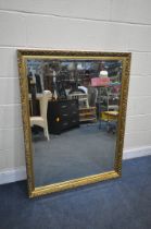 A LARGE GILT FRAMED BEVELLED EDGE WALL MIRROR, 100cm x 130cm (condition report: good)