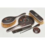 SIX DRESSING TABLE ITEMS, to include a silver and tortoiseshell hand held mirror and brush set,