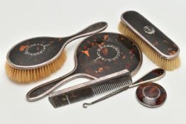SIX DRESSING TABLE ITEMS, to include a silver and tortoiseshell hand held mirror and brush set,