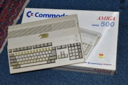 A COMMODORE AMIGA 500 COMPUTER BOXED, does not include any cables or accessories (except an Anti-
