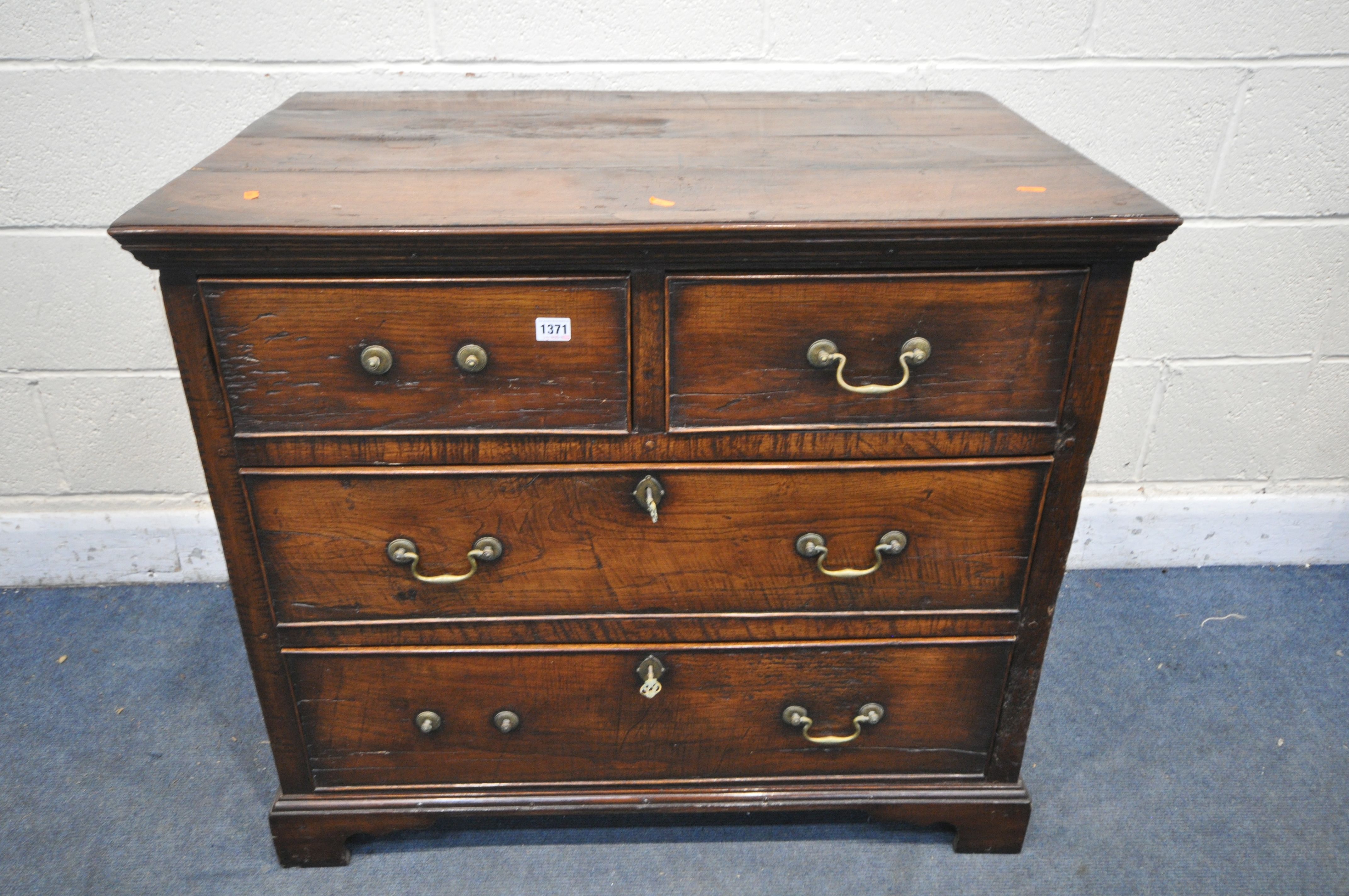 A GEORGIAN STYLE OAK CHEST OF TWO SHORT OVER TWO LONG DRAWERS, incorporating 18th century timbers,