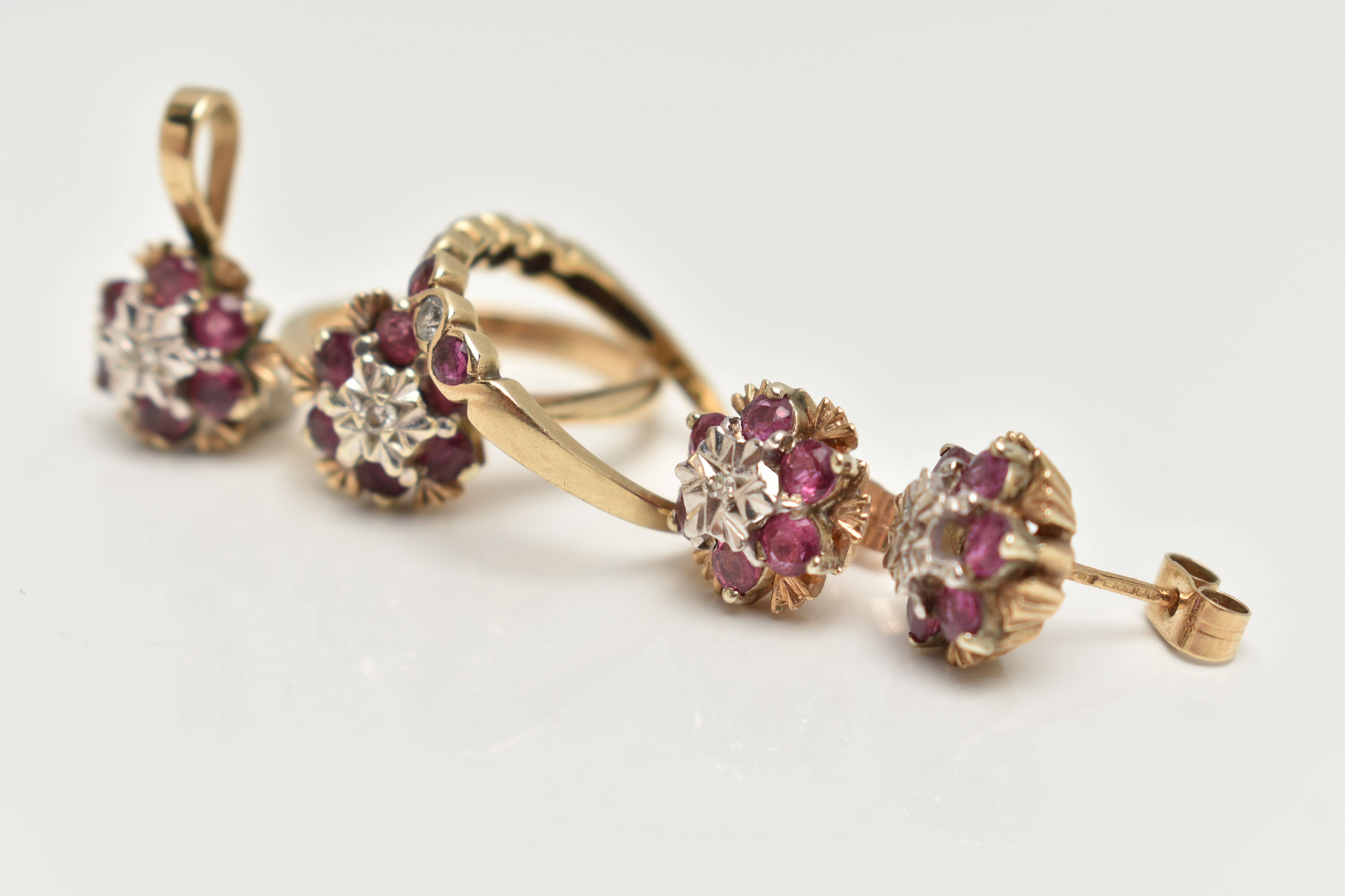 TWO 9CT GOLD RUBY AND DIAMOND RINGS, EARRINGS AND A PENDANT, the first a cluster ring, set with a - Image 3 of 4