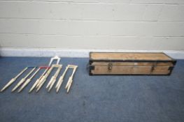 A TOWNSEND CROQUET SET, in a pine case, comprising four mallets, fifteen balls and seven cast iron