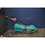 A BOSCH ROTAK 32-12 ELECTRIC LAWN MOWER with grass box (PAT pass and working)