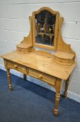 A PINE DRESSING TABLE, with a single drawer and four drawers, width 115cm x depth 51cm x height