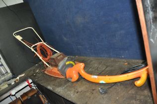 A FLYMO DLE900 VINTAGE ELECTRIC HOVER MOVER (PAT fail due to uninsulated plug but working) and a